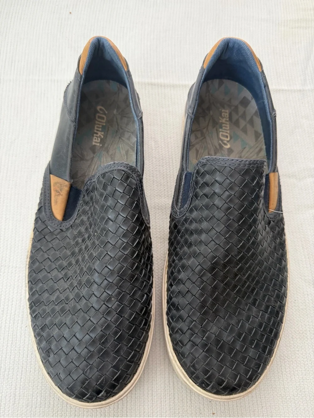 OluKai Men's Woven Slip-On Loafers in Black with Tan Accents